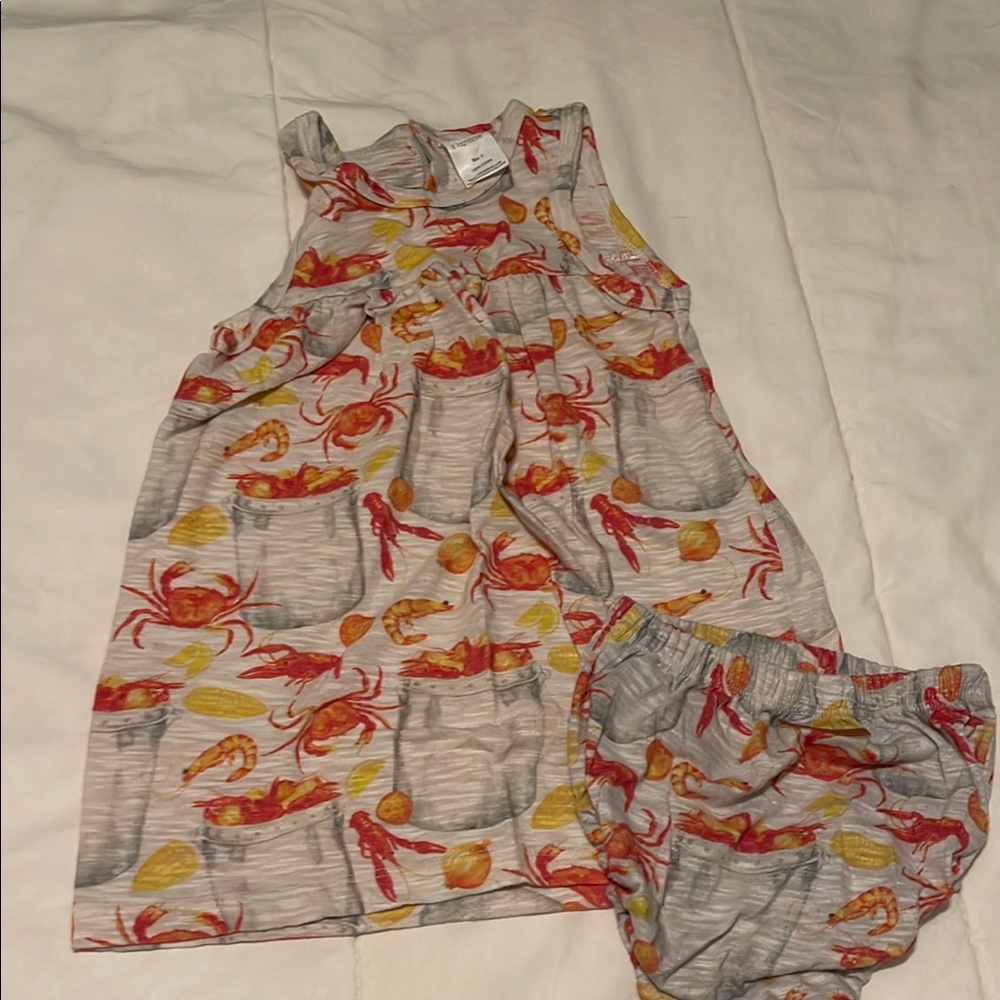 Gray Outfit with Red and Yellow crawfish boil
